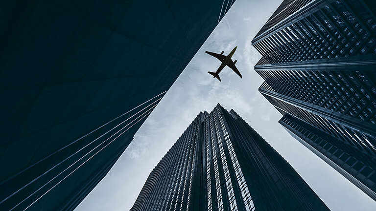 airplane buildings skyscrapers desktop wallpaper cover