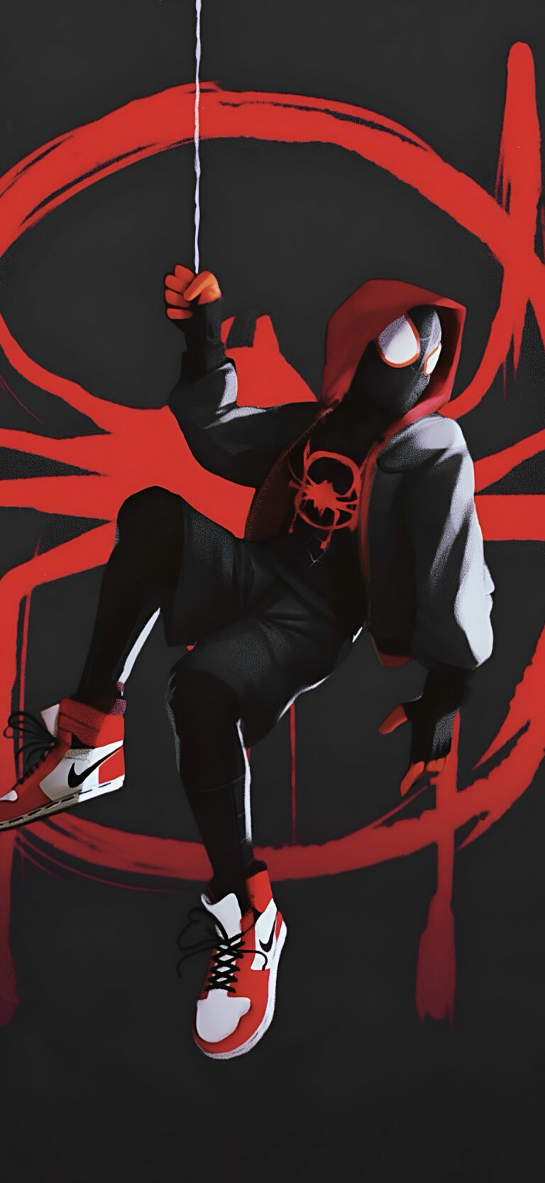 Spider-Man Miles Morales Swinging on a Web Wallpapers